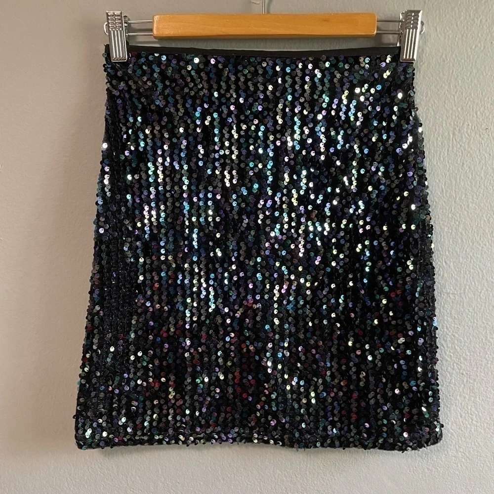Molly Bracken multi color sequins black mini skirt. Size XS.